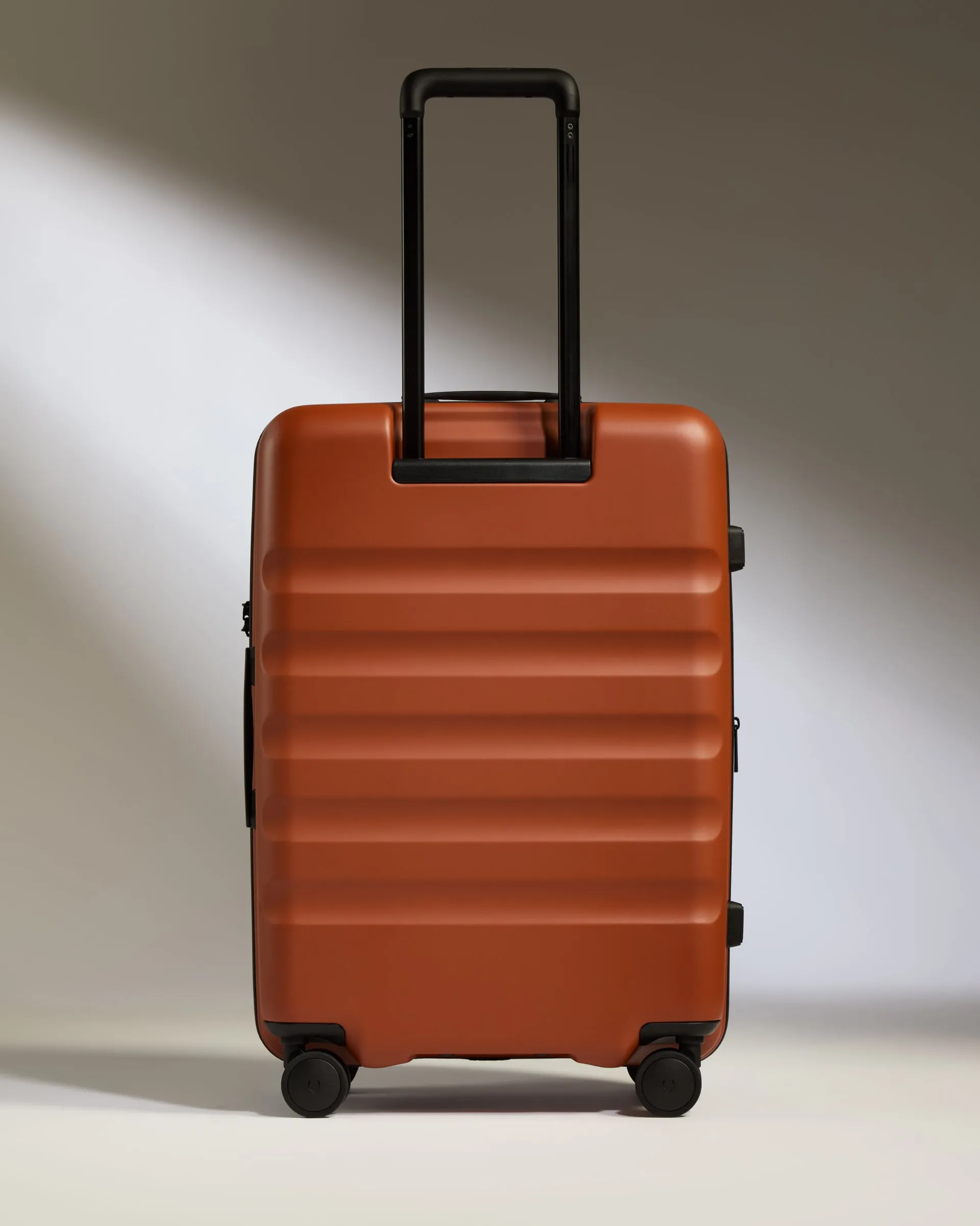 Medium Suitcase in Maple Red - Icon Stripe